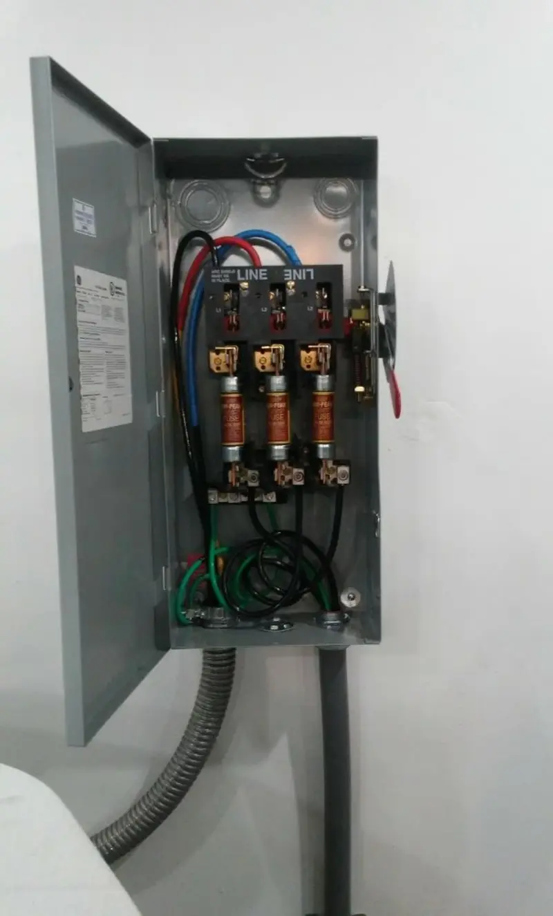 Three-phase disconnect switch installed for Smoke Detector Installation in Barron
